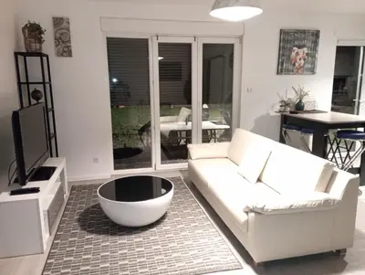Coin salon dans l'établissement Maison avec terrasse