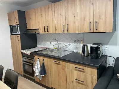 Cuisine ou kitchenette dans l'établissement Appartement 11 - Au cœur du Lac Blanc