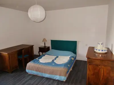 Un ou plusieurs lits dans un hébergement de l'établissement Le Gîte des Chevaliers