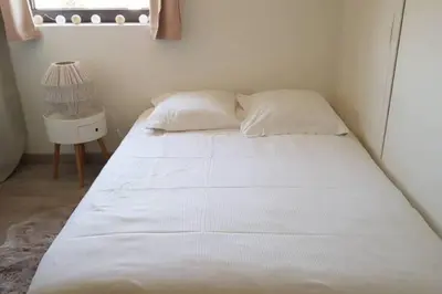 Un ou plusieurs lits dans un hébergement de l'établissement Grand Appartement Cosy Chez Pépette à 5 min de Colmar