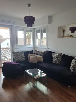 Coin salon dans l'établissement Appartement proche centre-ville, parking gratuit