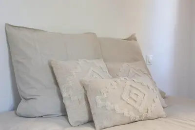 Un ou plusieurs lits dans un hébergement de l'établissement La Chambre Aux Anges