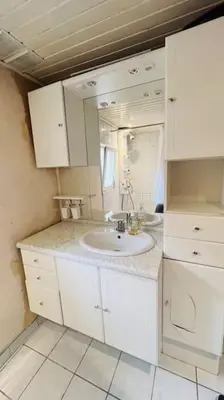 Salle de bains dans l'établissement Maison de Renaud