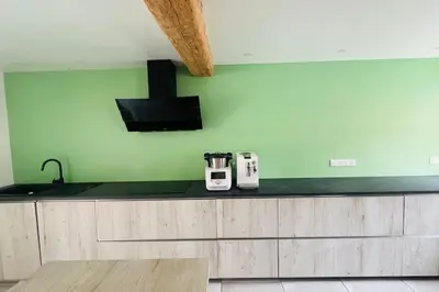 Cuisine ou kitchenette dans l'établissement Maison de Renaud
