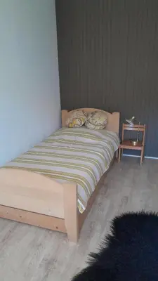 Un ou plusieurs lits dans un hébergement de l'établissement Appartement osca des brimbelles