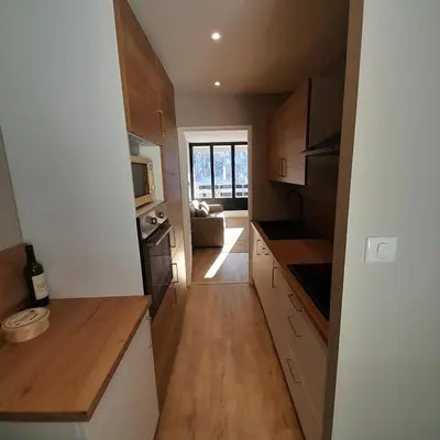 Cuisine ou kitchenette dans l'établissement Appartement osca des brimbelles