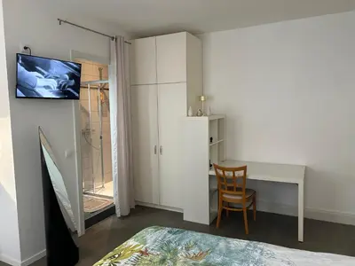 Télévision ou salle de divertissement dans l'établissement Salutho