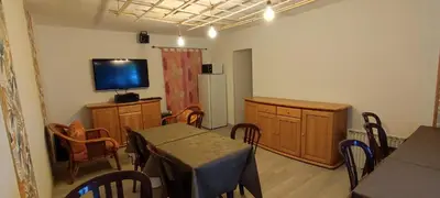 Télévision ou salle de divertissement dans l'établissement Ô2J