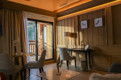 Coin salon dans l'établissement Domaine de Montagne - Hôtel Chalet Frère Joseph