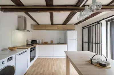 Cuisine ou kitchenette dans l'établissement Gîte Pomme d'Amour - 2 à 4 personnes