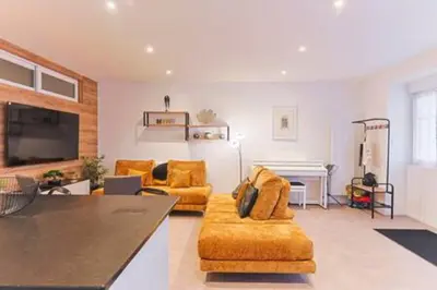 Télévision ou salle de divertissement dans l'établissement Appartement haut standing avec sauna