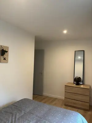 Un ou plusieurs lits dans un hébergement de l'établissement Appartement 2 chambres centre-ville
