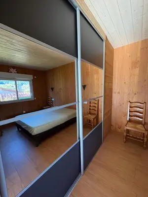 Un ou plusieurs lits dans un hébergement de l'établissement chalet pour amoureux à Gérardmer