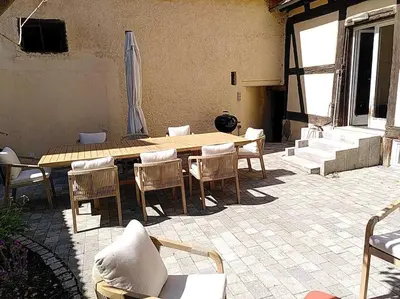 Coin salon dans l'établissement La Maison de l'Ours - Avec Patio & Garage - 8 personnes