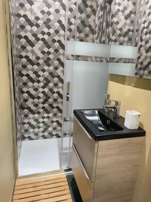 Cuisine ou kitchenette dans l'établissement Cocon de la vallée