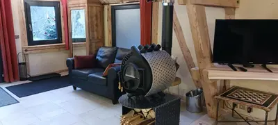 Télévision ou salle de divertissement dans l'établissement Gîte des Perdrix