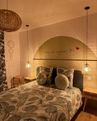 Un ou plusieurs lits dans un hébergement de l'établissement Zen&spa appartement avec jacuzzi et sauna privatif
