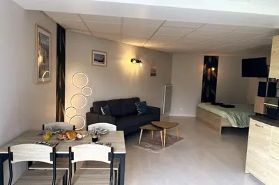 Coin salon dans l'établissement Le Refuge des 3M