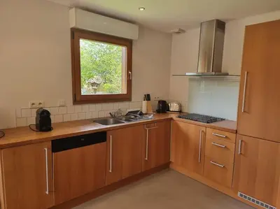 Cuisine ou kitchenette dans l'établissement Le Chalet Perla