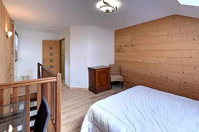 Un ou plusieurs lits dans un hébergement de l'établissement Pré Fleuri 1 - Appt vue lac et montagne