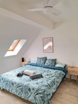 Un ou plusieurs lits dans un hébergement de l'établissement Chez Vincent - Centre Historique de Colmar avec parking inclus