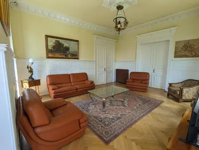 Coin salon dans l'établissement Villa Historique Ideale Groupes et Familles