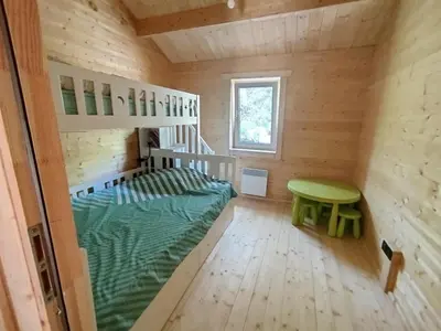 Un ou plusieurs lits dans un hébergement de l'établissement Chalet 