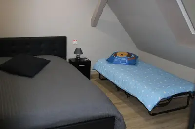 Un ou plusieurs lits dans un hébergement de l'établissement Spacieux duplex 1 à 6 personnes