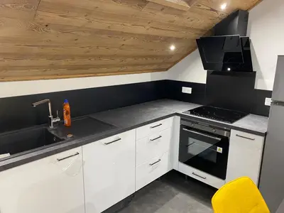 Cuisine ou kitchenette dans l'établissement Gérardmer chalet le Belvédere vue lac, piste de ski