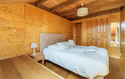 Un ou plusieurs lits dans un hébergement de l'établissement Nice Home In Gérardmer With Sauna