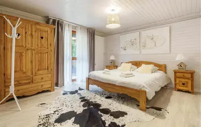 Un ou plusieurs lits dans un hébergement de l'établissement Nice Home In Gérardmer With Sauna