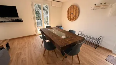 Télévision ou salle de divertissement dans l'établissement L Envol Maison Entière