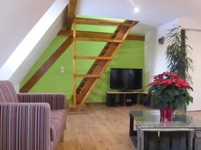 Télévision ou salle de divertissement dans l'établissement Gite du Meunier