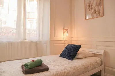Un ou plusieurs lits dans un hébergement de l'établissement La Bohème - Idéal familles, hyper centre
