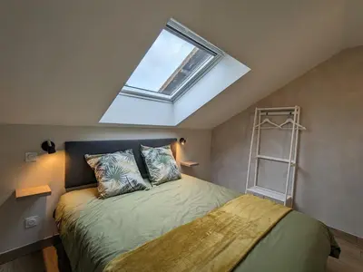 Un ou plusieurs lits dans un hébergement de l'établissement Cosy gîte dans les Vosges, terrasse privative, idéal randonnées - FR-1-589-643
