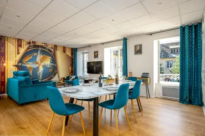Télévision ou salle de divertissement dans l'établissement Le 42-GregIMMO-Appart'Hôtel