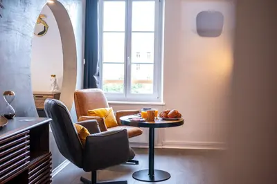 Coin salon dans l'établissement Le 37-GregIMMO-Appart'Hôtel