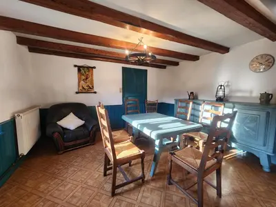 Coin salon dans l'établissement Maison de Vacances