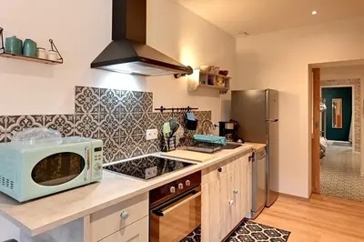 Cuisine ou kitchenette dans l'établissement La Ligne Bleue des Vosges - Appt proche des pistes