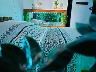Un ou plusieurs lits dans un hébergement de l'établissement Studio séance sur l'oreiller