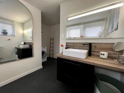 Cuisine ou kitchenette dans l'établissement Les deux maisons - Roz - Appartement Gérardmer vue pistes proche lac