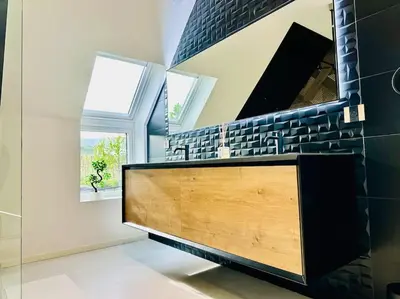 Télévision ou salle de divertissement dans l'établissement La Villa du Vignoble d Alsace