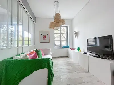Télévision ou salle de divertissement dans l'établissement Appartement centre historique