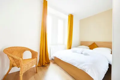 Un ou plusieurs lits dans un hébergement de l'établissement RB-1D Appartement F2 au 1er étage à Mulhouse de 1 à 2 pers
