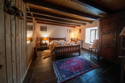 Un ou plusieurs lits dans un hébergement de l'établissement La ferme aux belles sources
