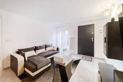 Coin salon dans l'établissement Batié - Appt 4 personnes à Mulhouse