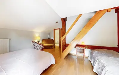 Un ou plusieurs lits dans un hébergement de l'établissement Beautiful Home In Taintrux With Wifi