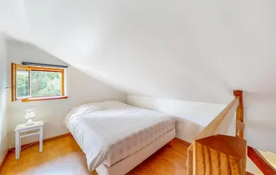 Un ou plusieurs lits dans un hébergement de l'établissement Beautiful Home In Taintrux With Wifi