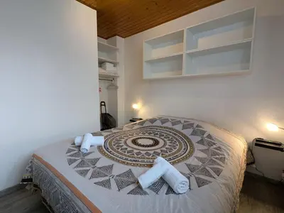 Un ou plusieurs lits dans un hébergement de l'établissement Appartement Ruby