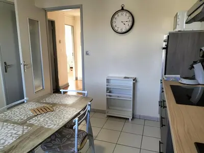 Cuisine ou kitchenette dans l'établissement Escale